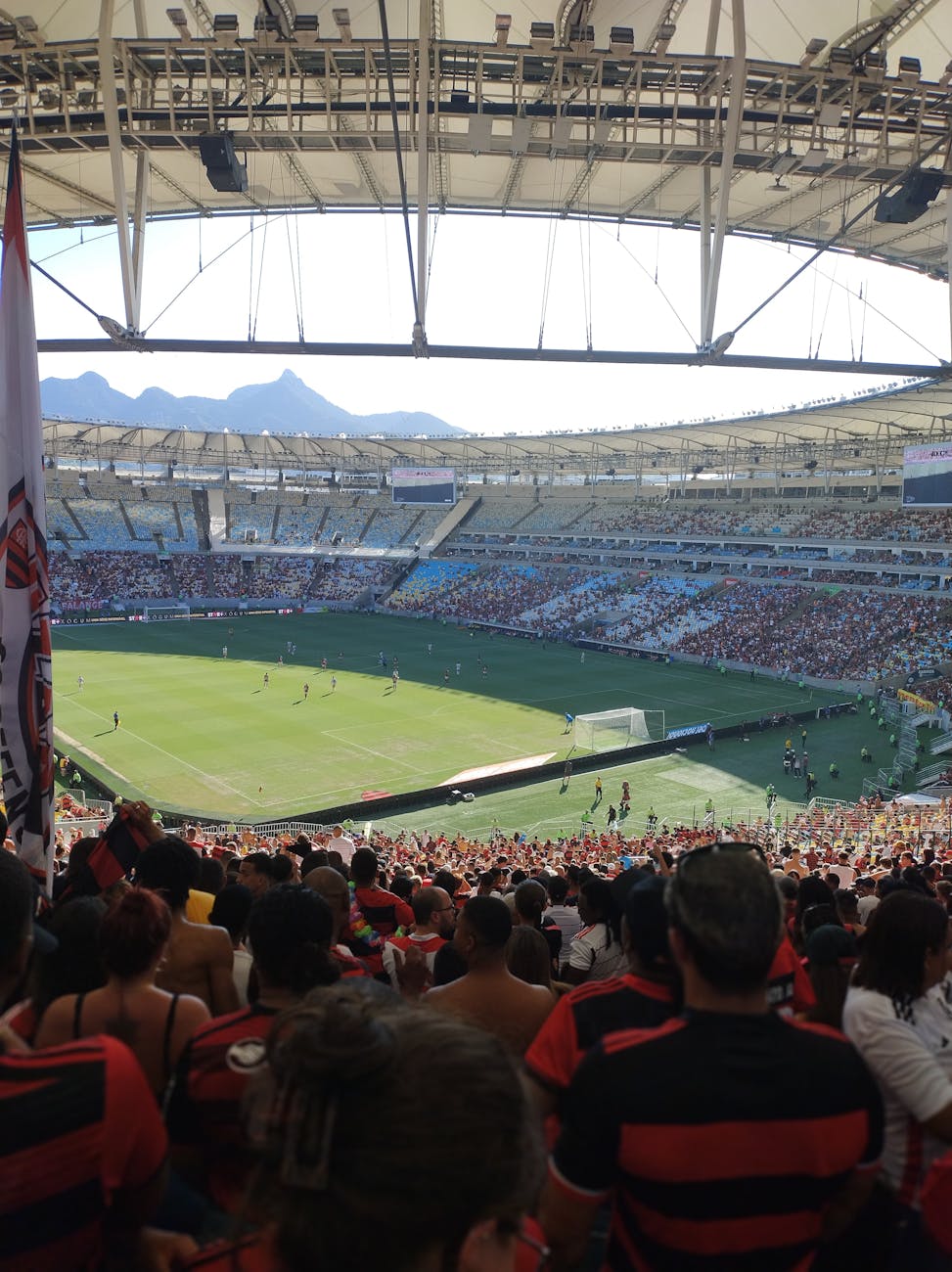 crowd enjoys soccer match at maracana stadium