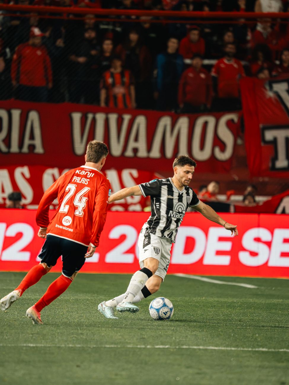 intense soccer match on vibrant stadium field