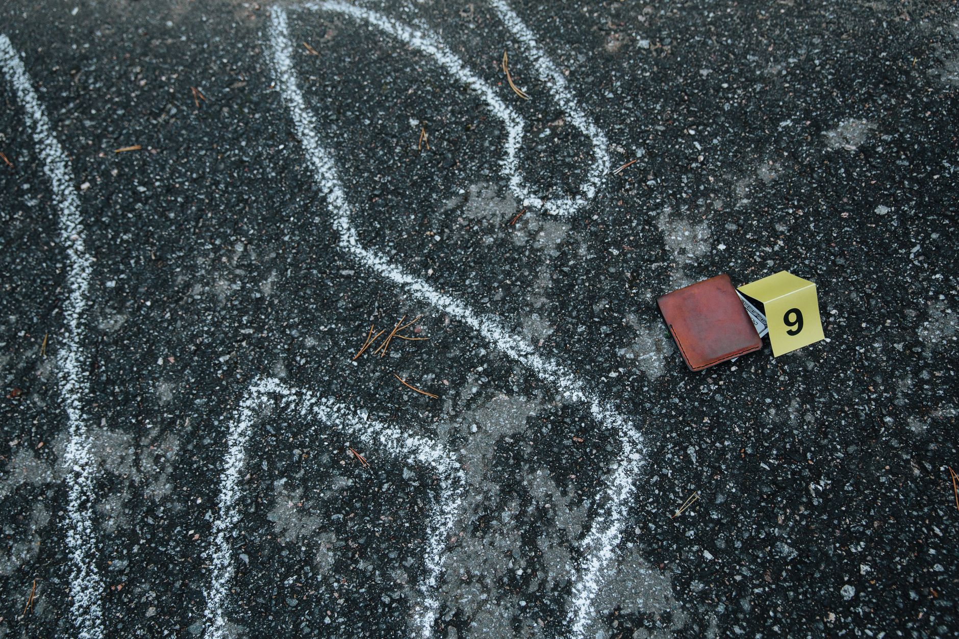 brown leather wallet on the crime scene